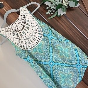 Maurice s tank top, sheer with lacey upper back! Size small. Mint condition!